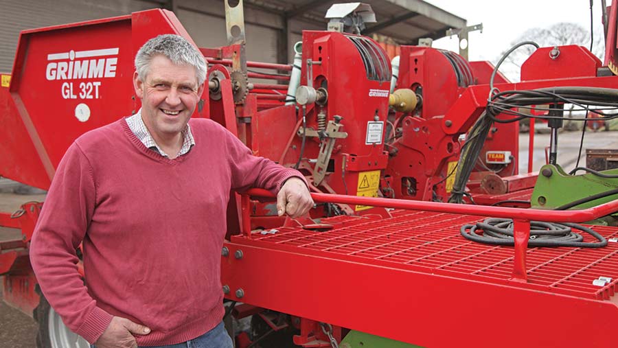 Adam Clarke in front of the Grimme GL32T