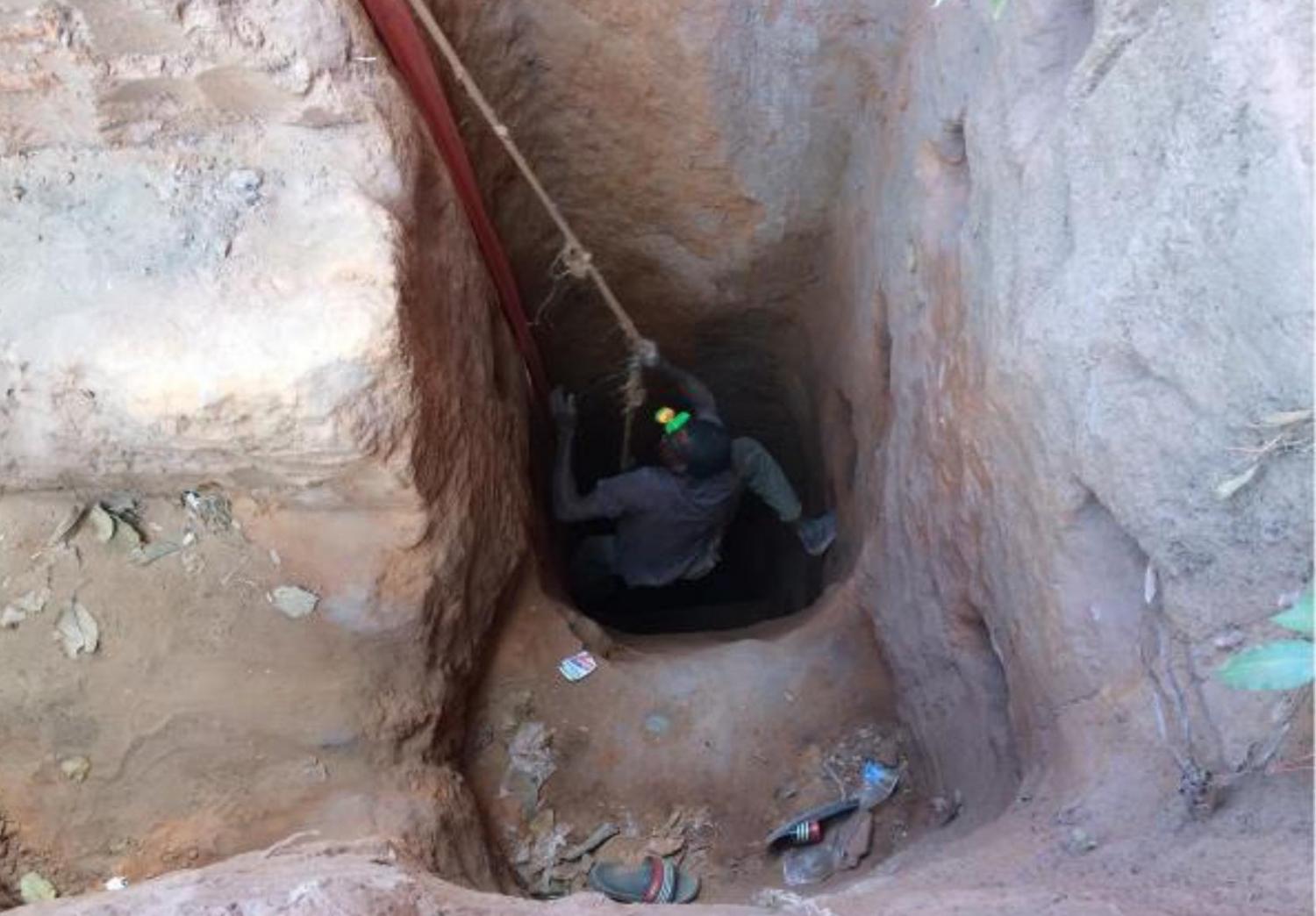 Photograph of a young cobalt miner indebted to a mining boss in the Democratic Republic of the Congo