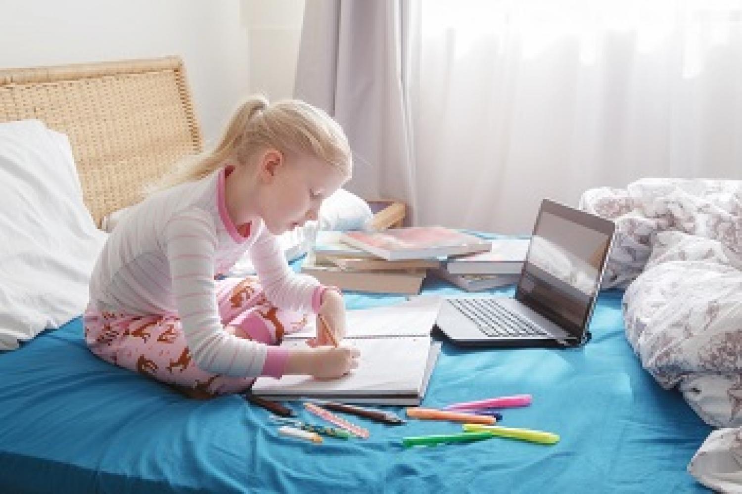 Girl doing schoolwork at home